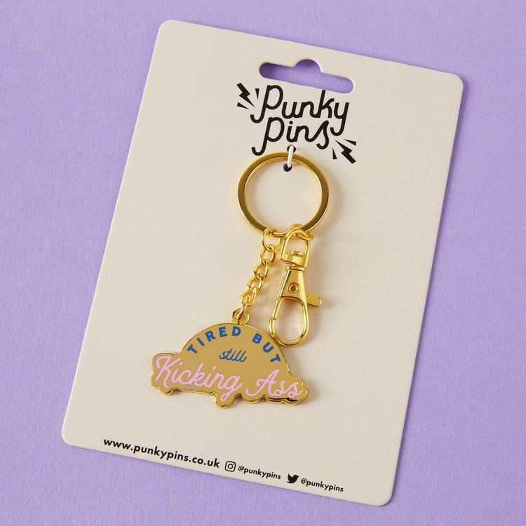 Tired But Kicking Ass Enamel Keychain
