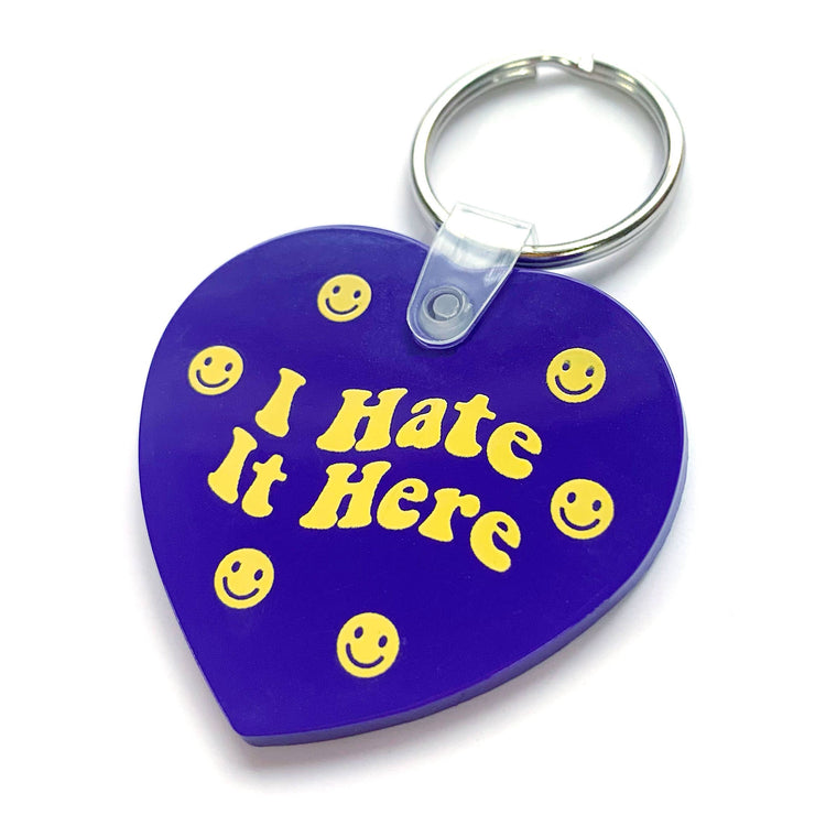 I Hate It Here Purple Happy Face Heart Shaped Vinyl Keychain
